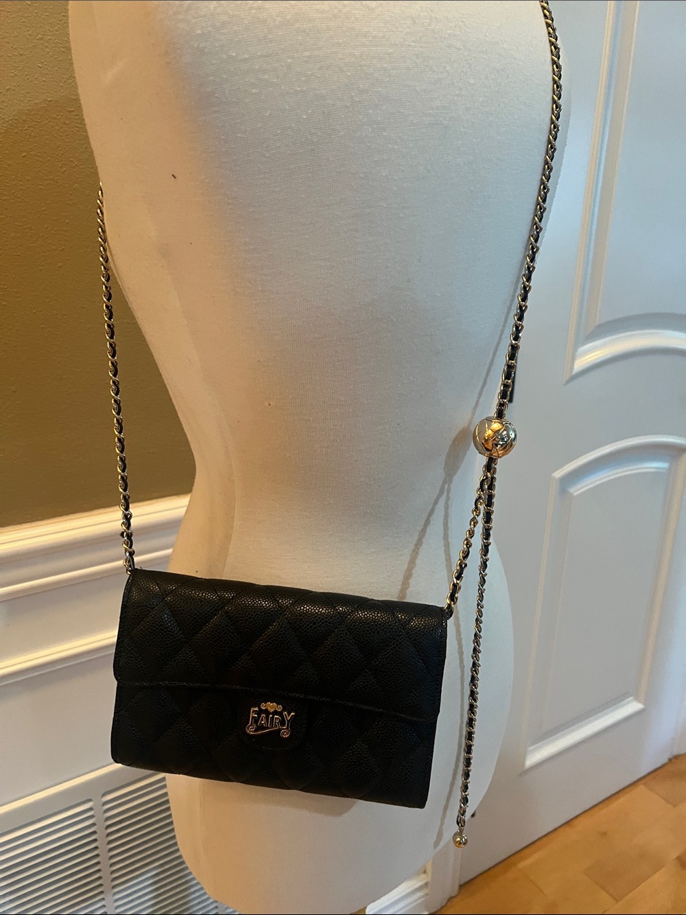 Black Quilted Crossbody Bag with Chain and Gold Accent